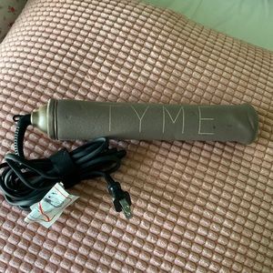 TYME all-in-one curling iron/straightener